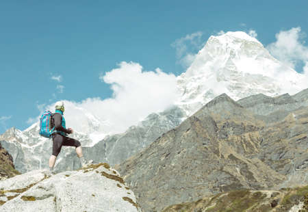 Person travelling in Mountains daylight soft tone with copy spaceの写真素材
