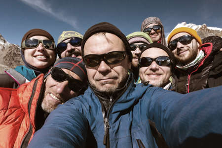 Self Portrait of Team of Mountain Climbers smiling and happyの写真素材
