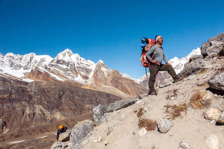 Team of Mountain Climbers led by Nepalese Sherpa Guideの写真素材