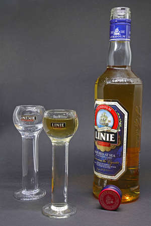bootle and glasses line aquavit a schnapps specialty from norwayのeditorial素材