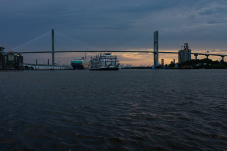 view over Savannah river and Talmadge Memorial Bridge during duskのeditorial素材