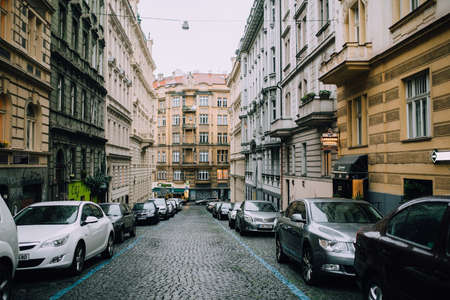 Prague, Czech Republic - May 2014. The historical street of the old town city with parking for residentsのeditorial素材
