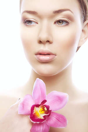 shiny woman with flower on white backgroundの写真素材
