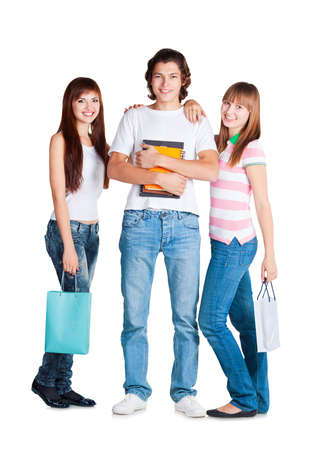students stand with yellow notebook and packages in their hands on white backgroundの写真素材
