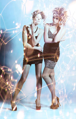 two girls in sudsの写真素材