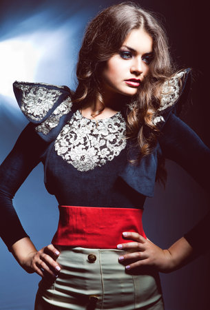 brunette woman in jacket with laces
