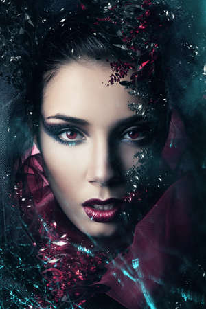 woman in hood with gemstonesの写真素材
