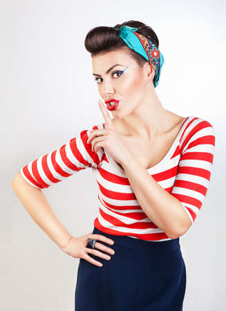 funny pin-up woman says quietの写真素材