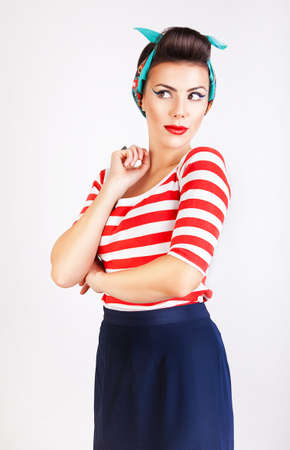sexy brunette woman in skirt and striped t-shirtの写真素材