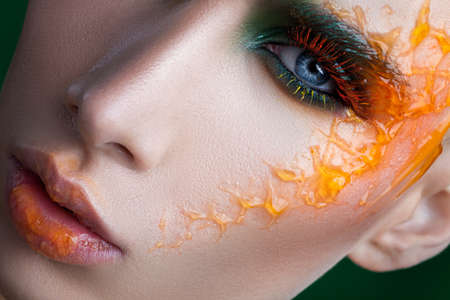 Face of a man with makeup close-upの写真素材