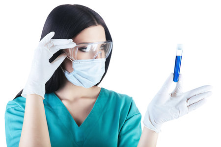 scientist looking at tube in hand on white background