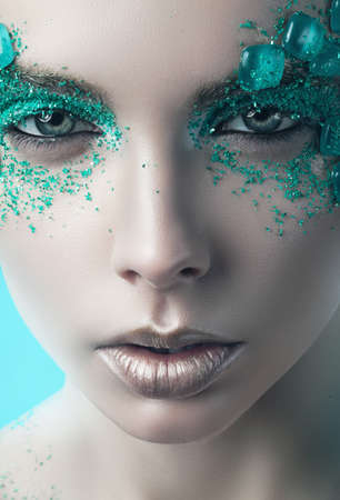 close-up portrait of turquoise womanの写真素材