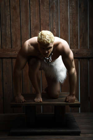 Very strong man in a roomの写真素材