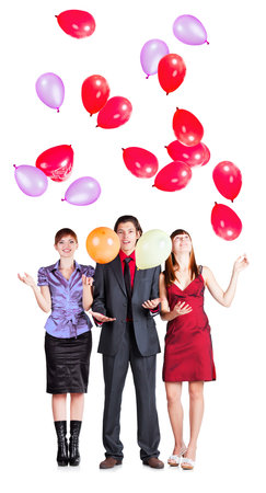 corporate party; business group is plaiyng with balloons on white background