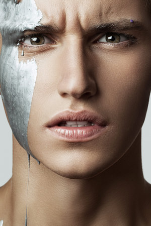 handsome man in paintの写真素材