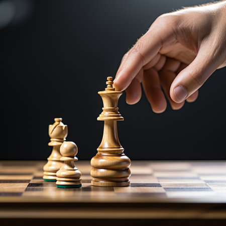 Hand of businessman playing a game of chess, strategy board game, problem solving, Risk management.の素材