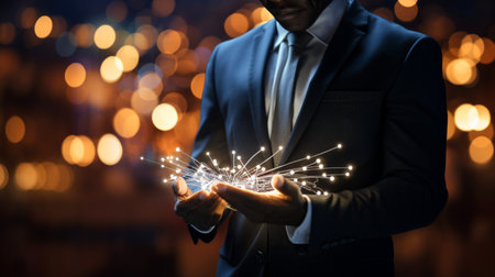 Businessman working with a digital phone or tablet on blurry dark bokeh background, Social media technology conceptの素材