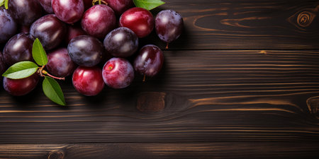 Top View of Fresh Ripe Plum on background, Juicy and tasty Fruit, Healthy Food, Copy space for text.の素材