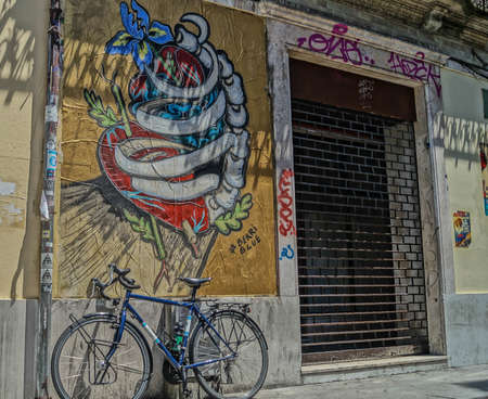 composition of graffiti in the wall and bike in the cityの写真素材