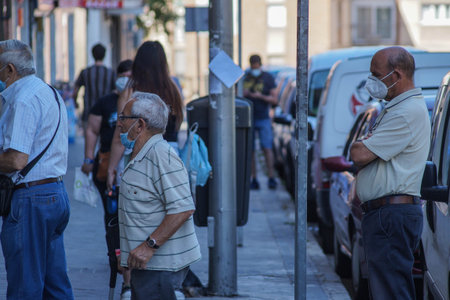 Madrid / Spain - 06/18/2020: Group of people on the street. New situation in Spain about the...