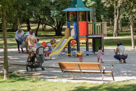 Madrid / Spain - 07 23 20: People on child park in Retiro in the summer, during Covid-19 pandemic.のeditorial素材