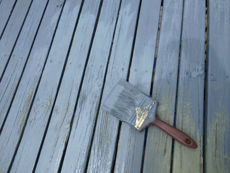 paint brush with unfinished paint jobの写真素材