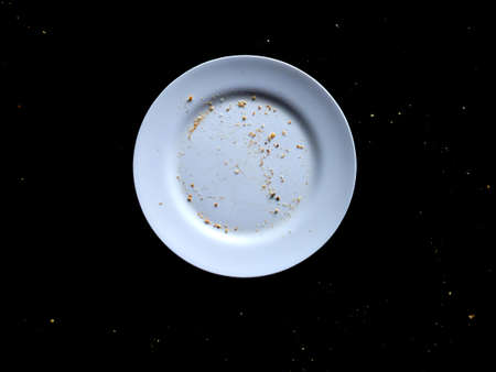 Isolated in Black and white plate with crumbsの写真素材