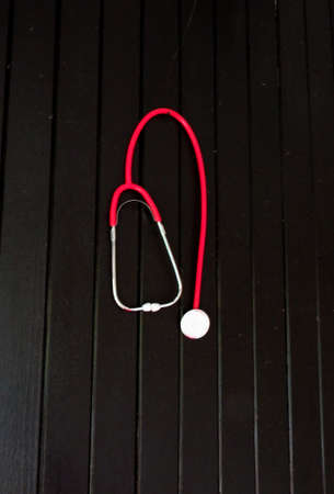 colorful stethoscope in black backgroundの写真素材