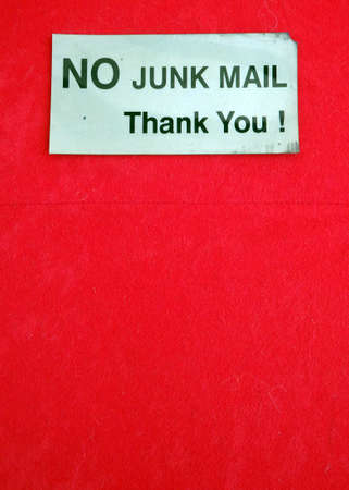 no junk mail sticker on red backgroundの写真素材