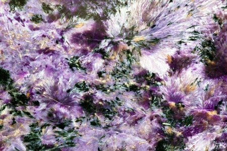 Siberian mineral named charoite texture surface backgroundの写真素材
