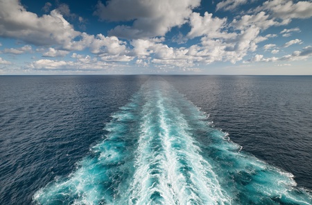 Ocean view from the deck of vessel with wake traceの写真素材