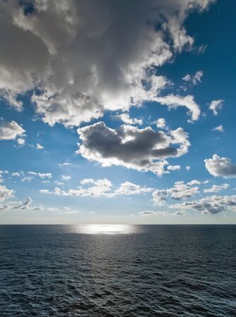 Seascape with  blue sky and cloudsの写真素材