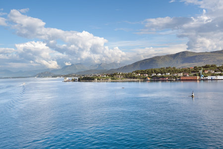 Scenic view of harbor from deck of cruise ship, Alesund (Norway)