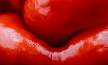 Super macro of a Trinidad Moruga Scorpion (Capsicum chinense). Partial image of a red hot chili pepper.の写真素材