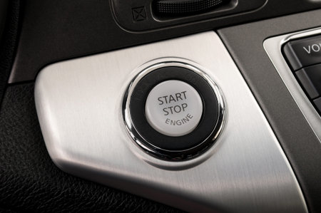 Car engine start and stop button. Interior detail.