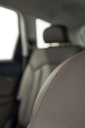 Car interior background. Detail of leather car seat.の写真素材