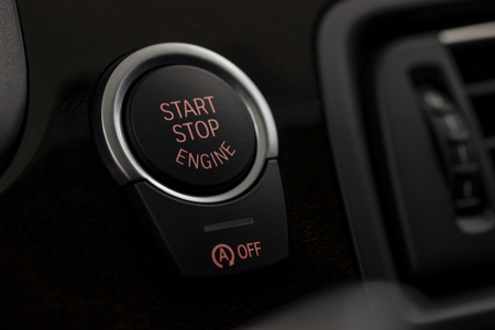 Car engine start and stop button. Interior detail. Macro photo.の写真素材