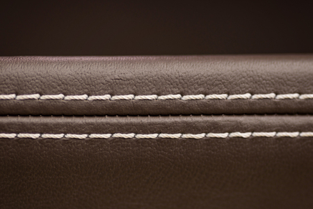 Leather background. Car interior detail. Macro photo.の写真素材