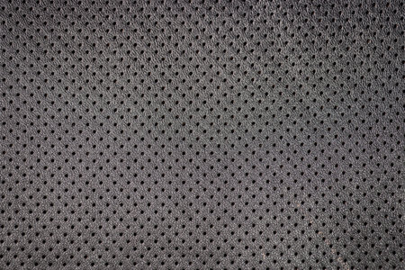 Modern car perforated leather. Interior detail. Macro.