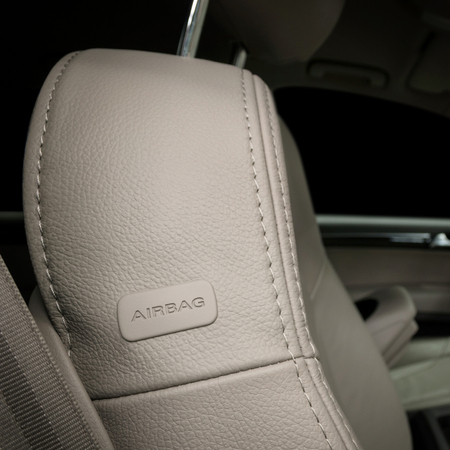 Car leather seat detail with airbag sign.の写真素材
