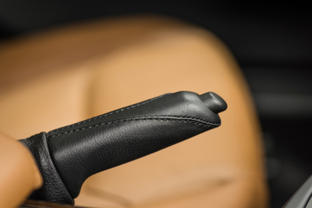 Hand brake in car. Auto interior detail.の写真素材