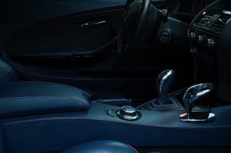 Car control panel with automatic transmission. Interior detail. View from passenger seat.