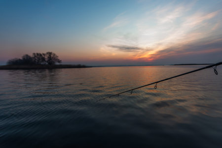 Fishing with spinning on river at morning.の写真素材