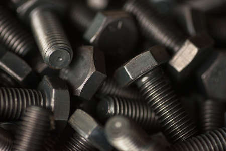 Metal bolts. Industrial background. Horizontal photo.の写真素材