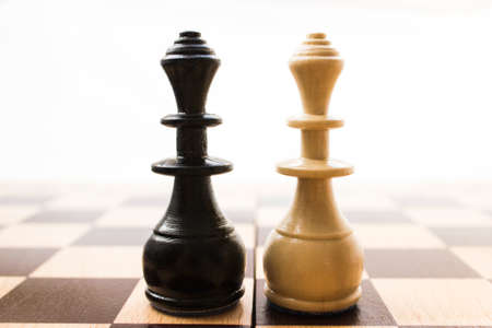 Chess pieces on a board in different compositions.の写真素材