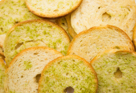 Healthy bruschettas baked with green herbs.の写真素材