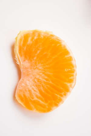 Vibrant mandarin fruit on a white background.の写真素材
