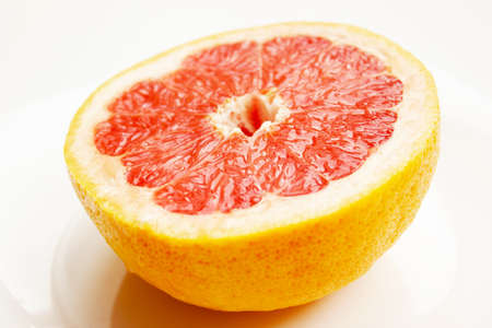Fresh composition of yellow and red grapefruits.の写真素材