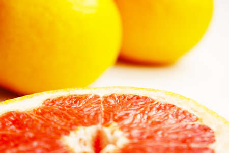 Fresh composition of yellow and red grapefruits.の写真素材