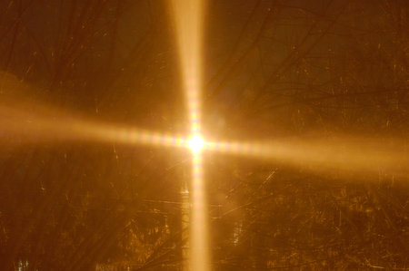 The light from the street lamp night, nice breaks hitting the window.の写真素材